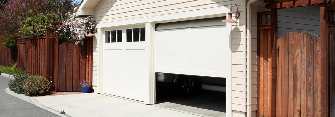 Fix Metal Garage Door Jerking in Elmhurst, Illinois